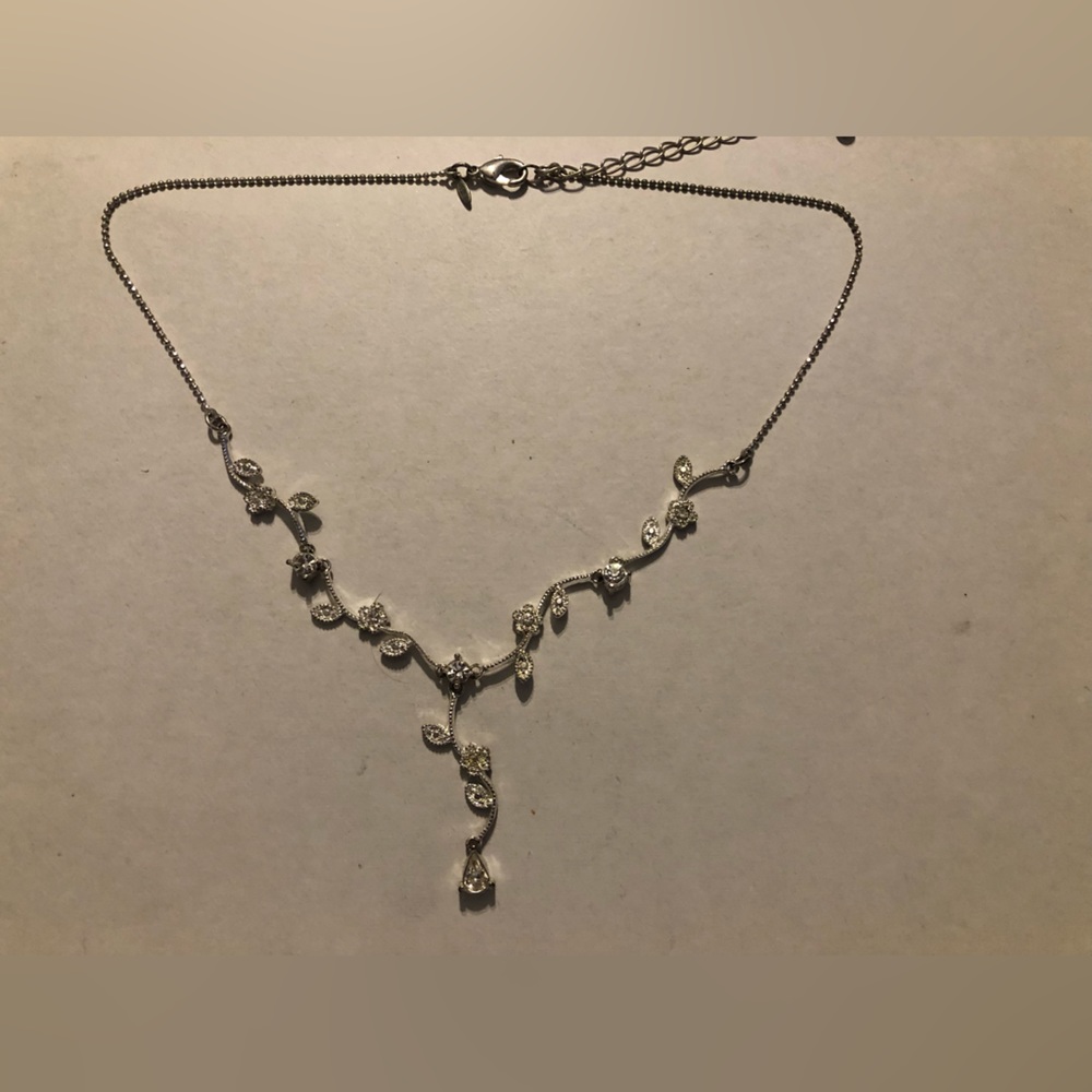 Silver rhinestone necklace.
